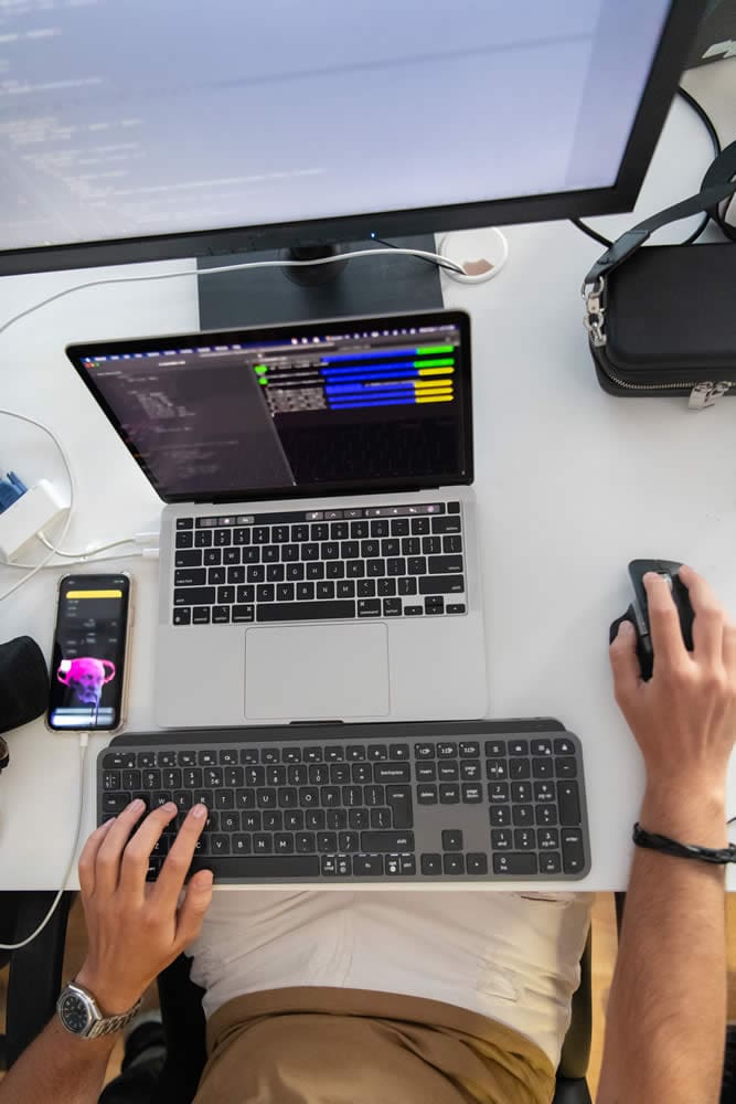 Web designer working on website using a laptop computer